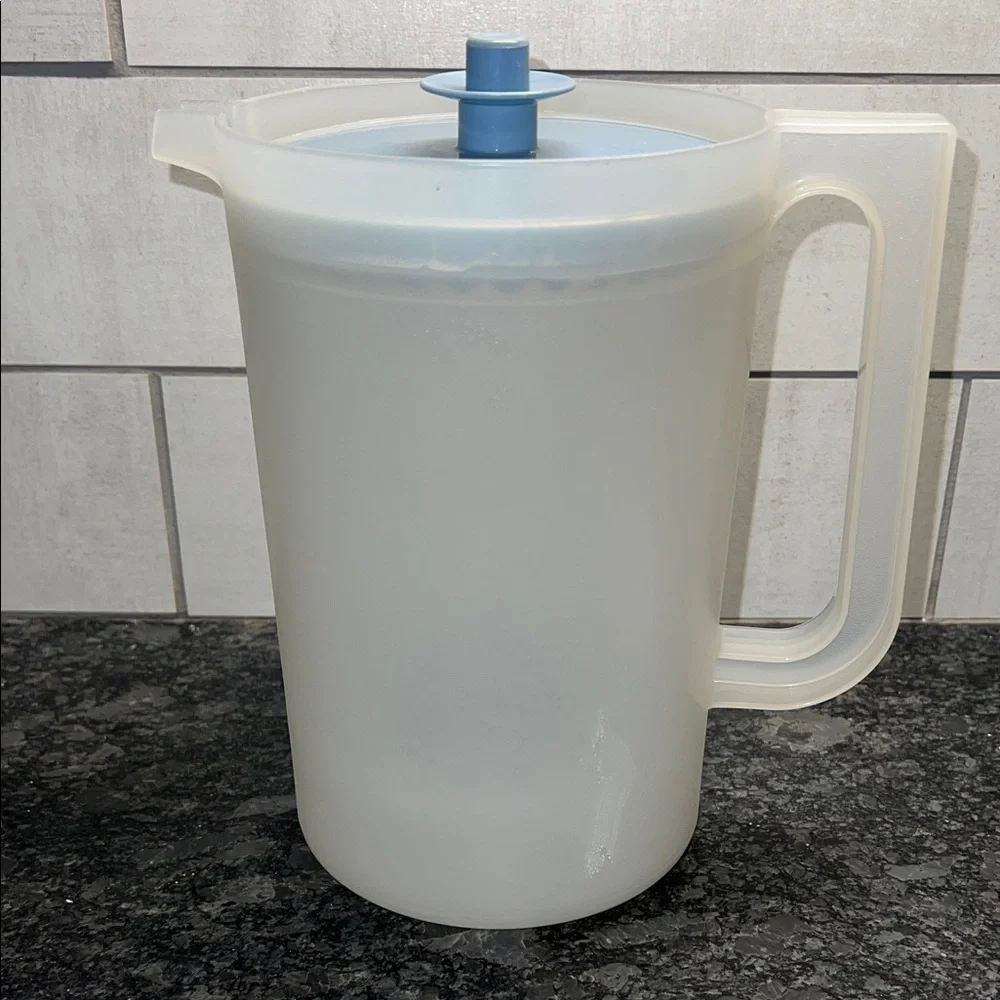 2qt Tupperware Translucent White Pitcher with Blue Lid. Like new